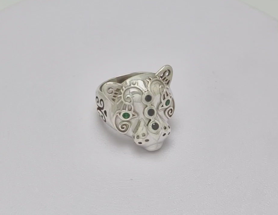 Statement jaguar ring with colorful emerald gemstones